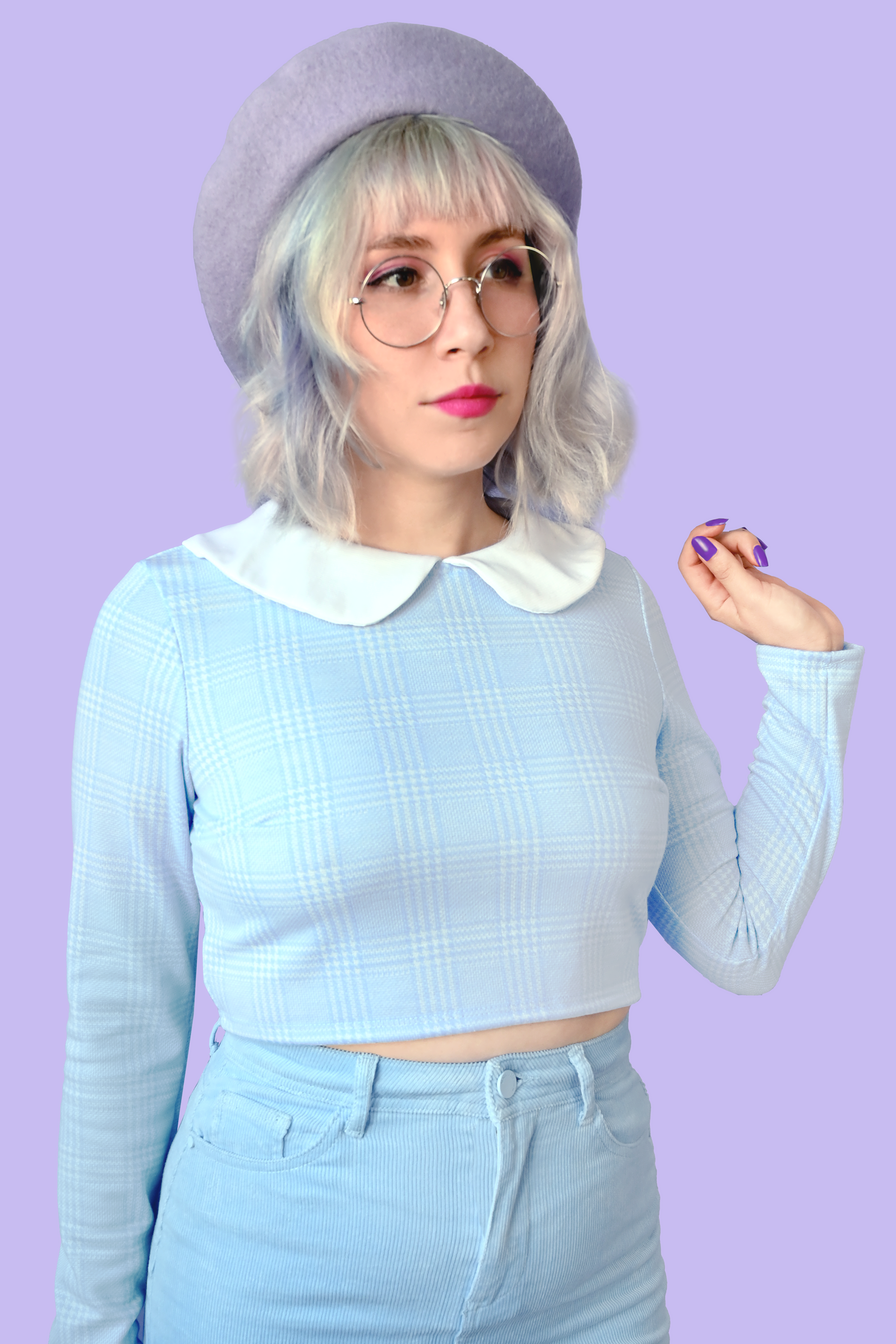 Long sleeve crop top with adorable Peter Pan collar detail. Back neck keyhole with button closure
