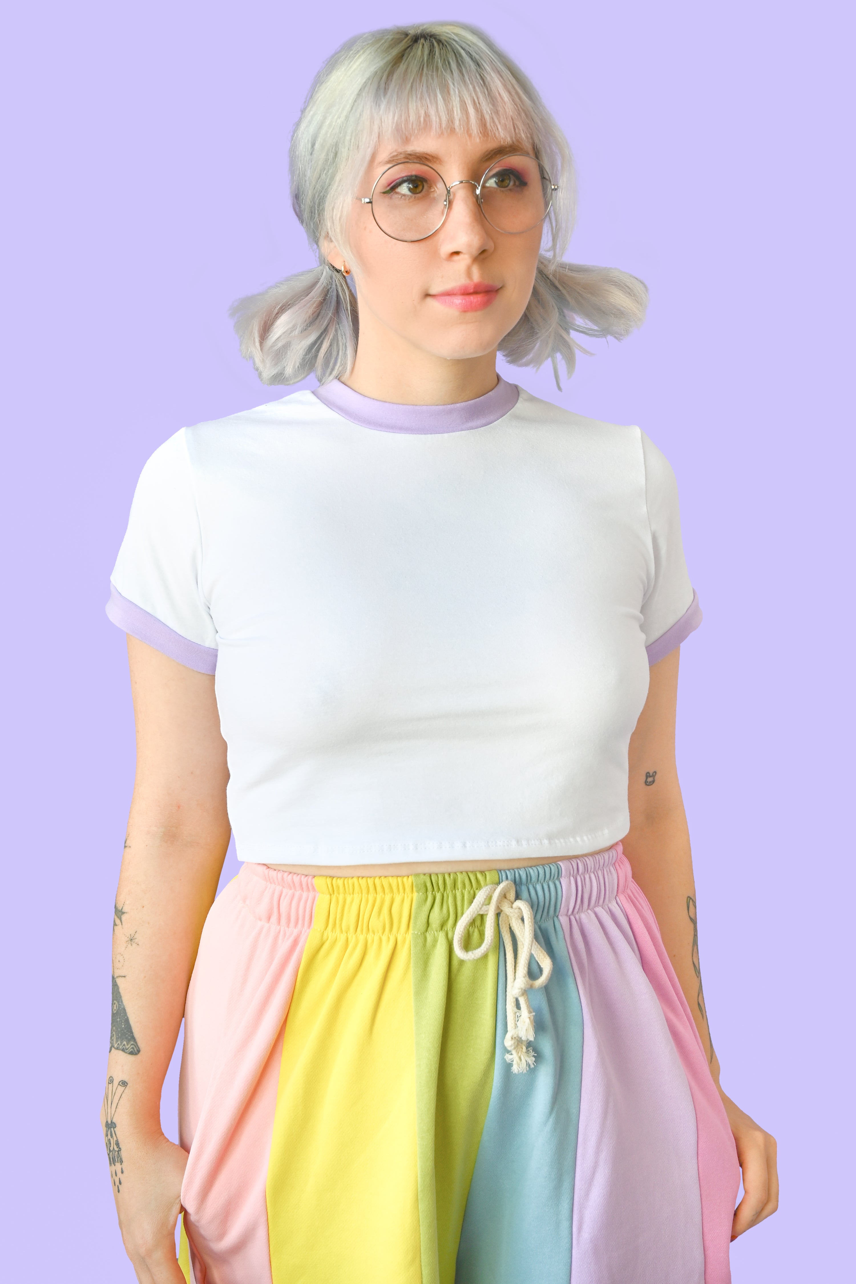 Cropped white tee with a pop of lavender on the sleeve and collar