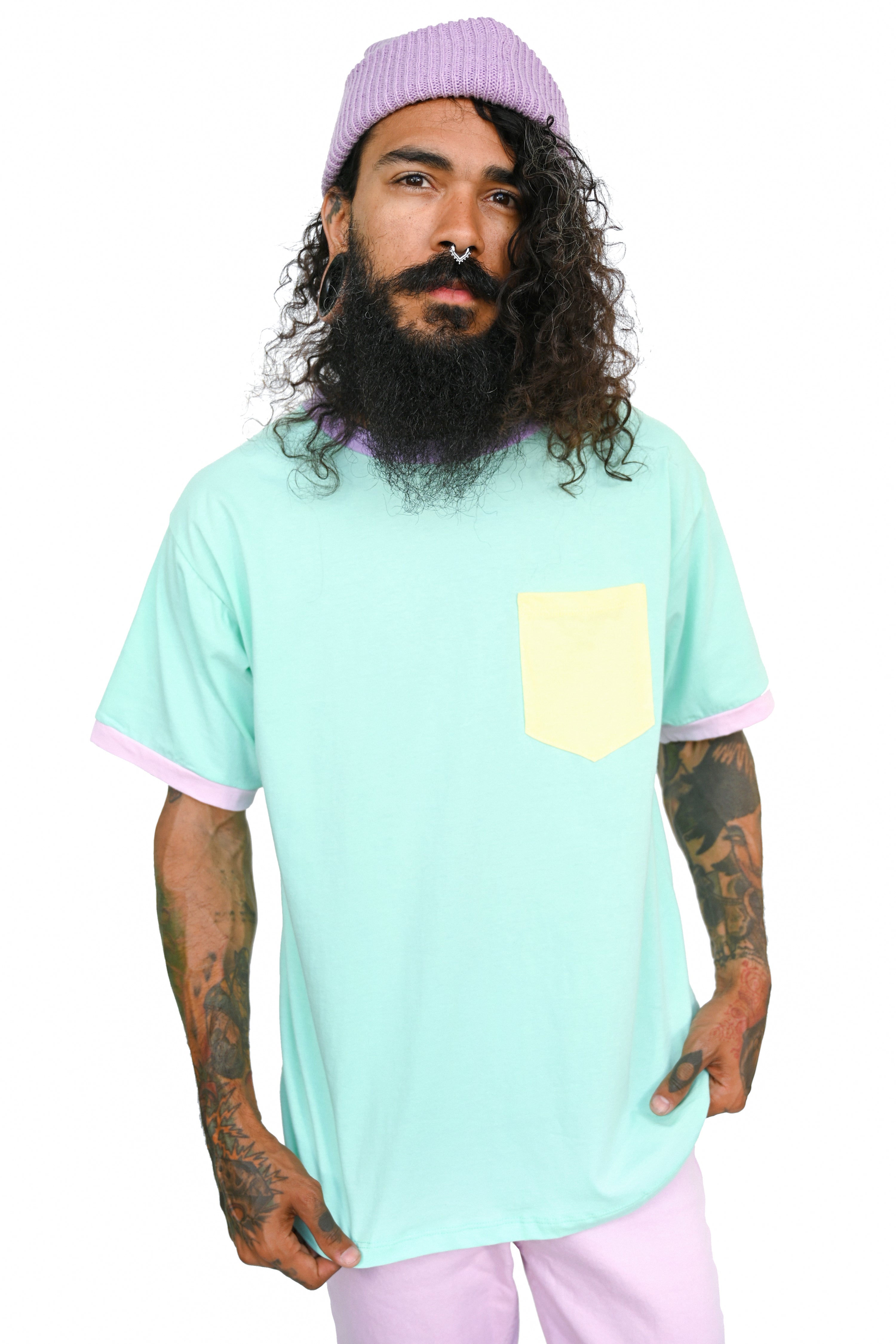 mint colorblock unisex t shirt with pink sleeve trim, yellow pocket, and lavender collar 