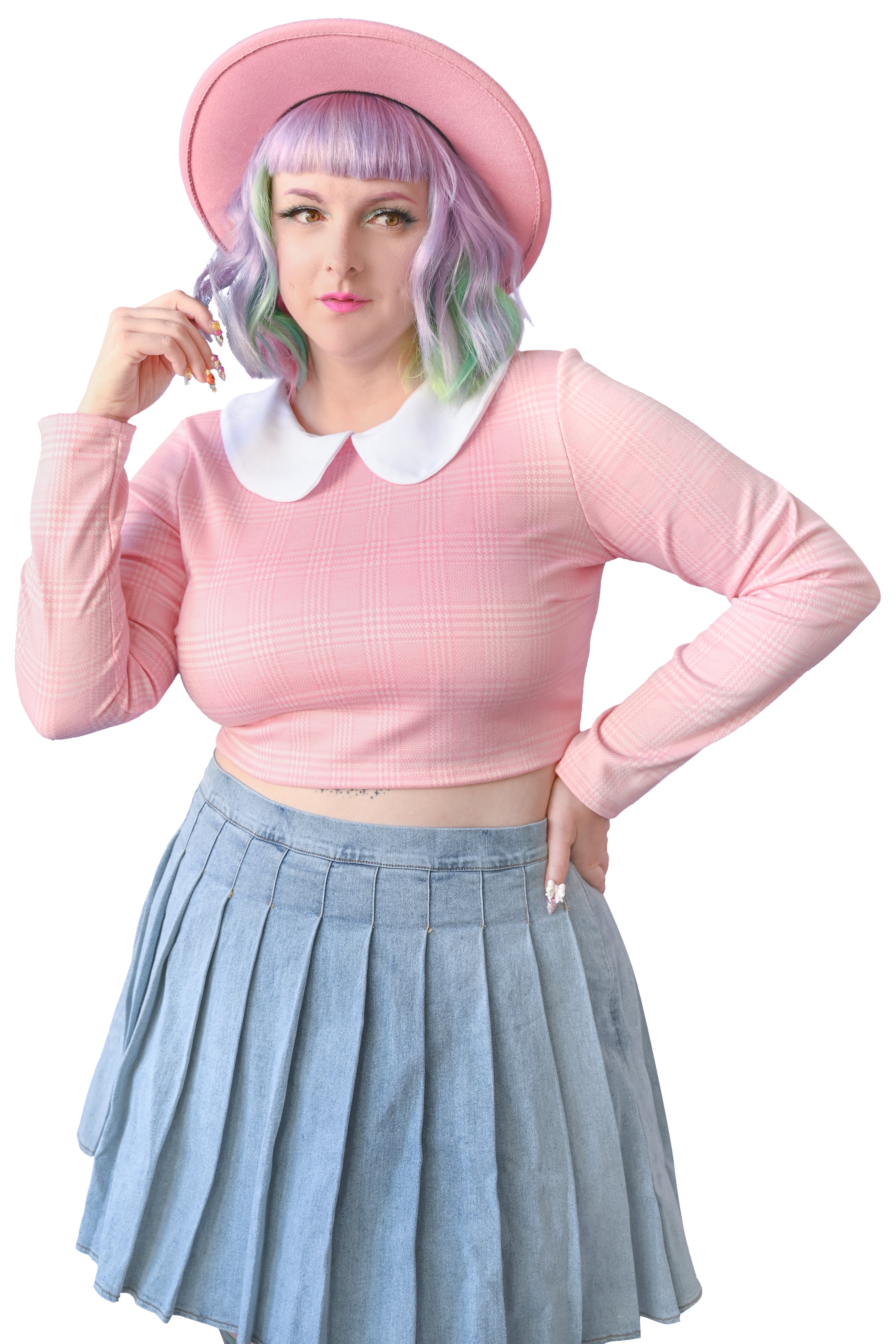 Long sleeve crop top with adorable Peter Pan collar detail. Back neck keyhole with button closure