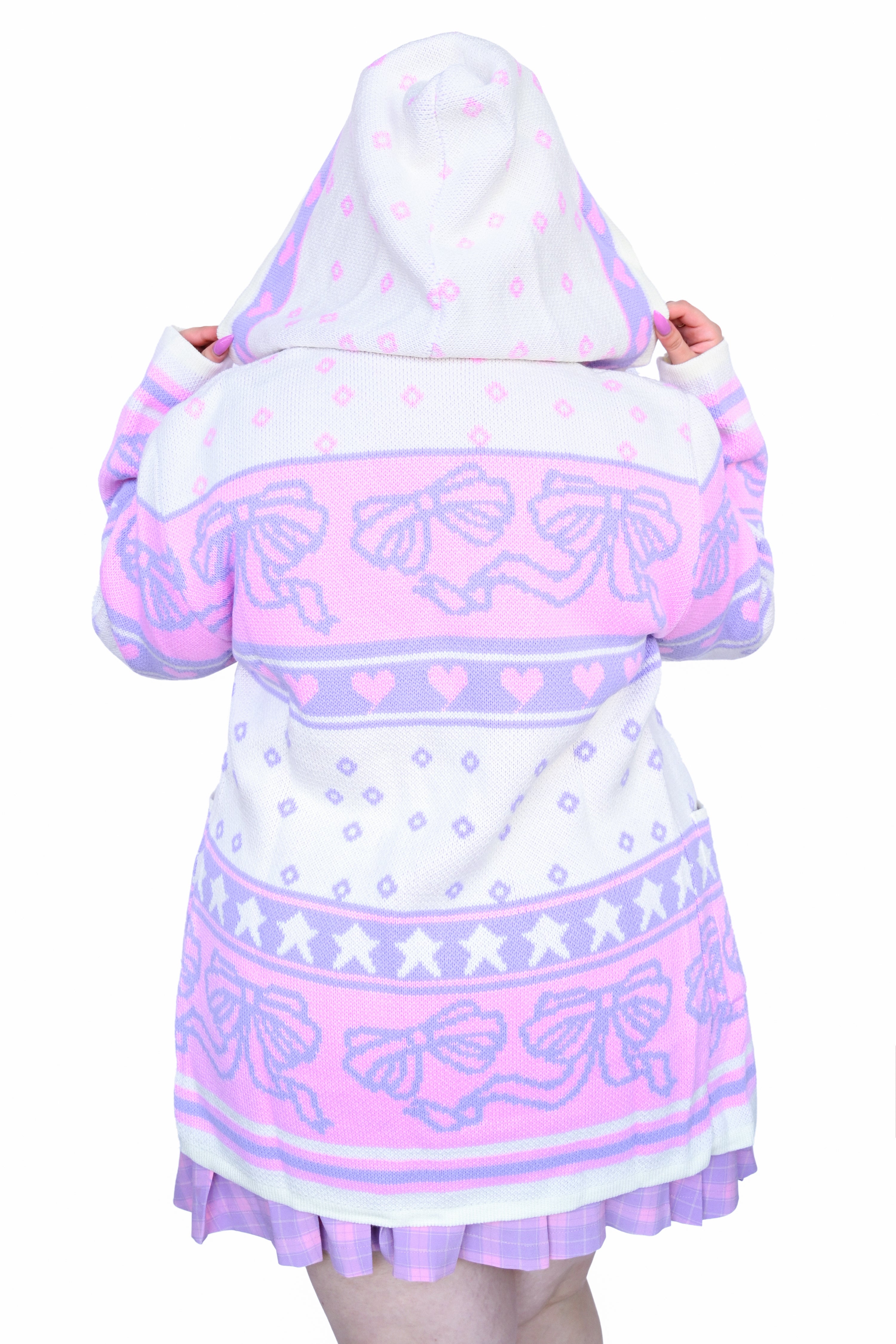 Thick zip up knit sweater with pink, lavender, and white knit, featuring bows, hearts, and stars