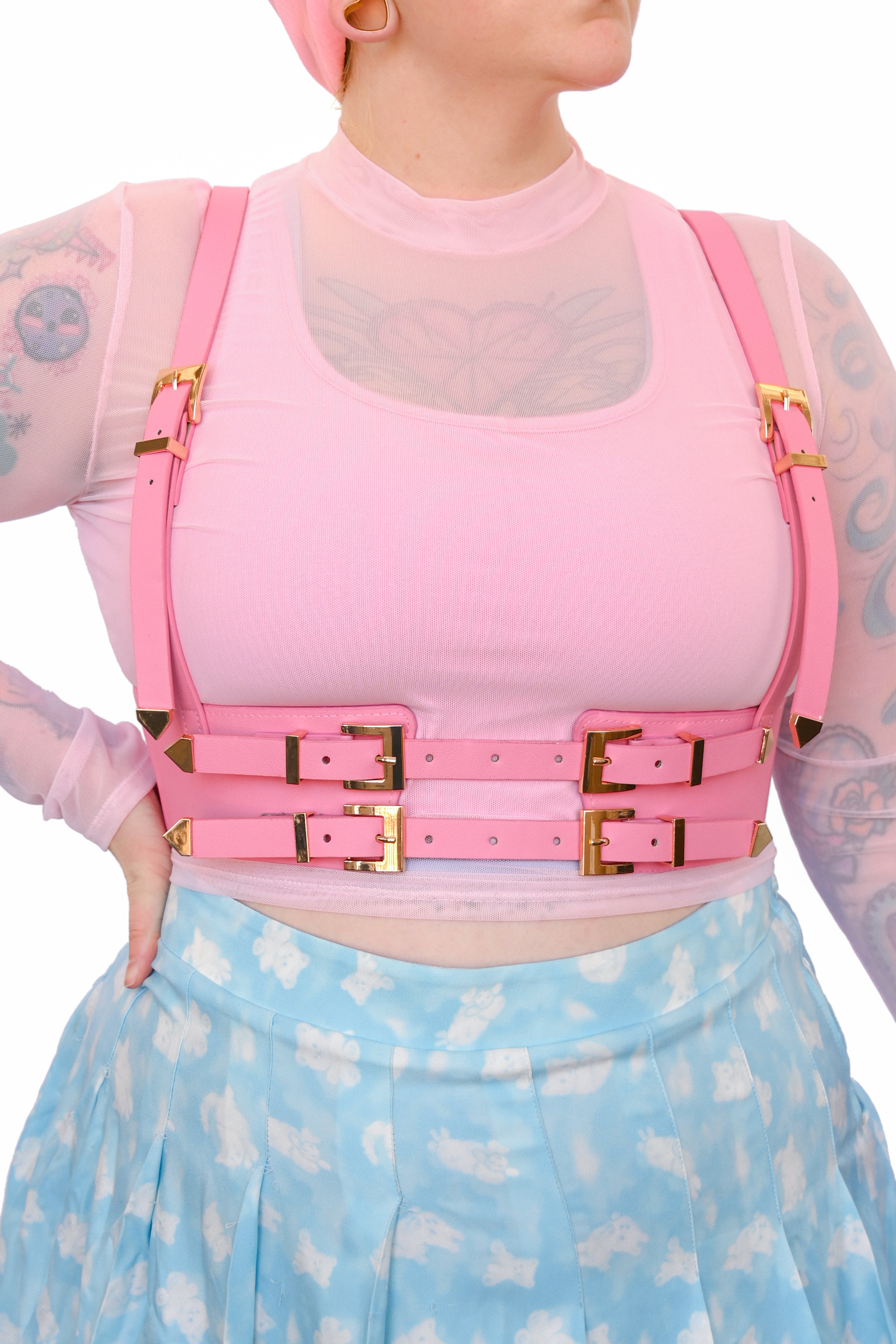 Pink fully adjustable vegan leather harness.  Elastic sides with fully adjustable front buckles and straps. Lots of stretch!