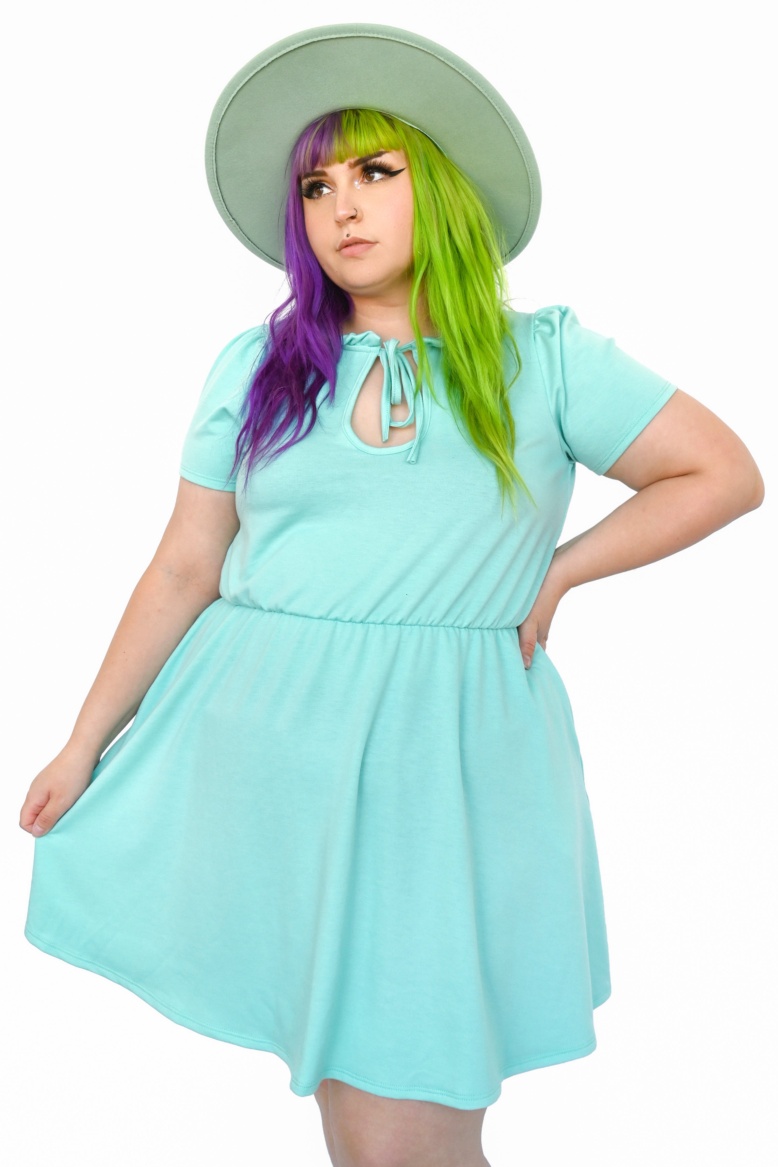 Mint tea dress with pockets and large tie keyhole cutout in front