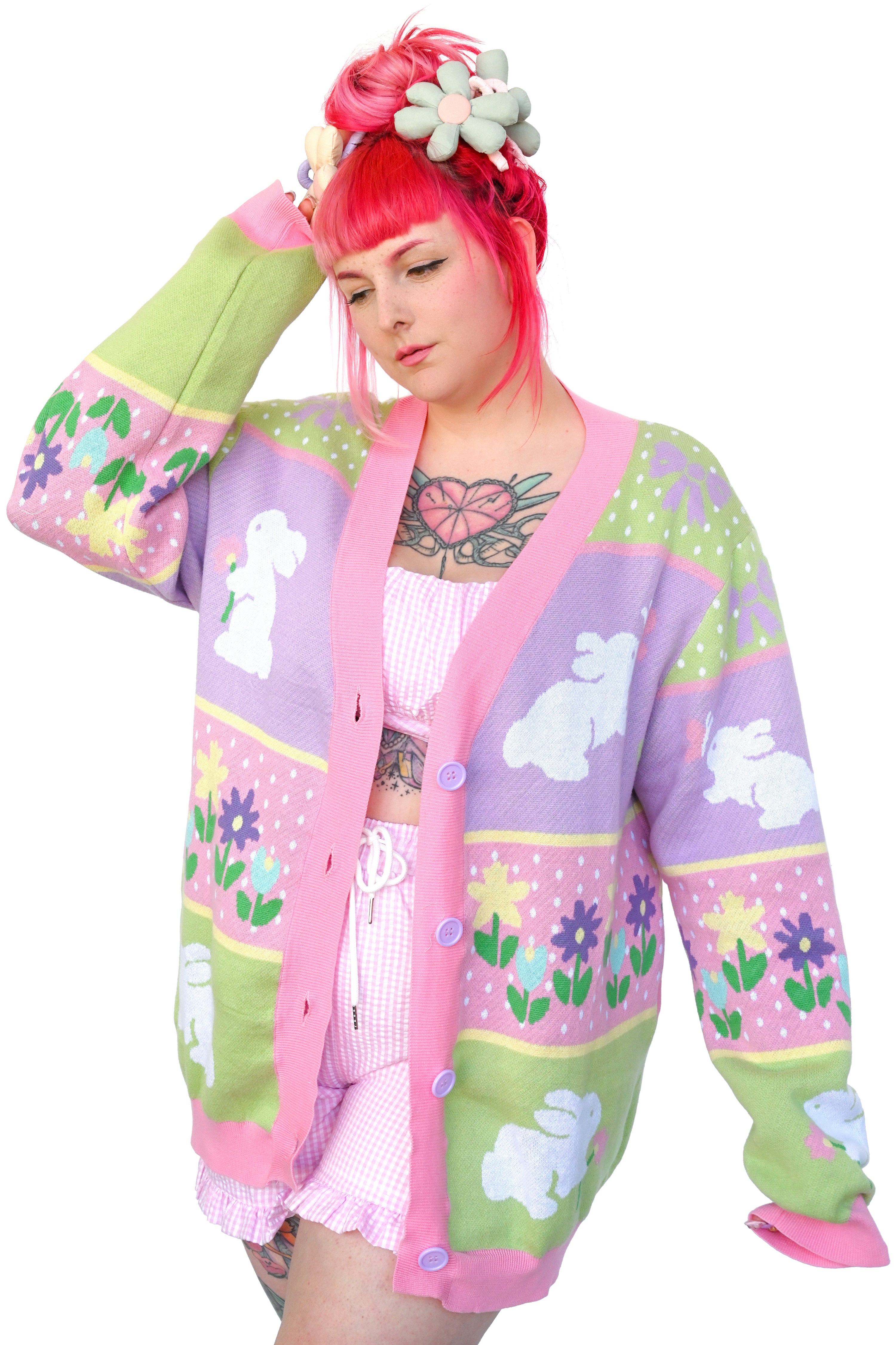 Model wearing lightweight cardigan with bunnies and flowers