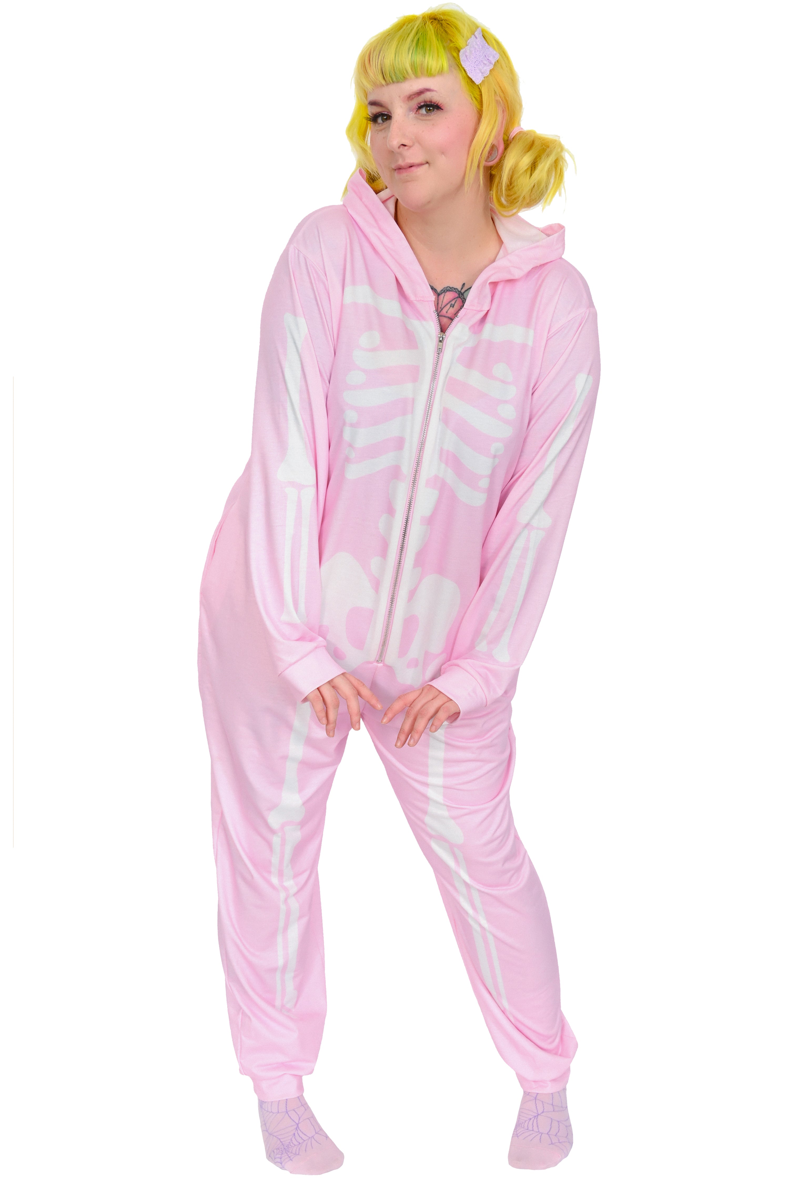 Pastel pink oversized onesie with full front and back white skeleton print.