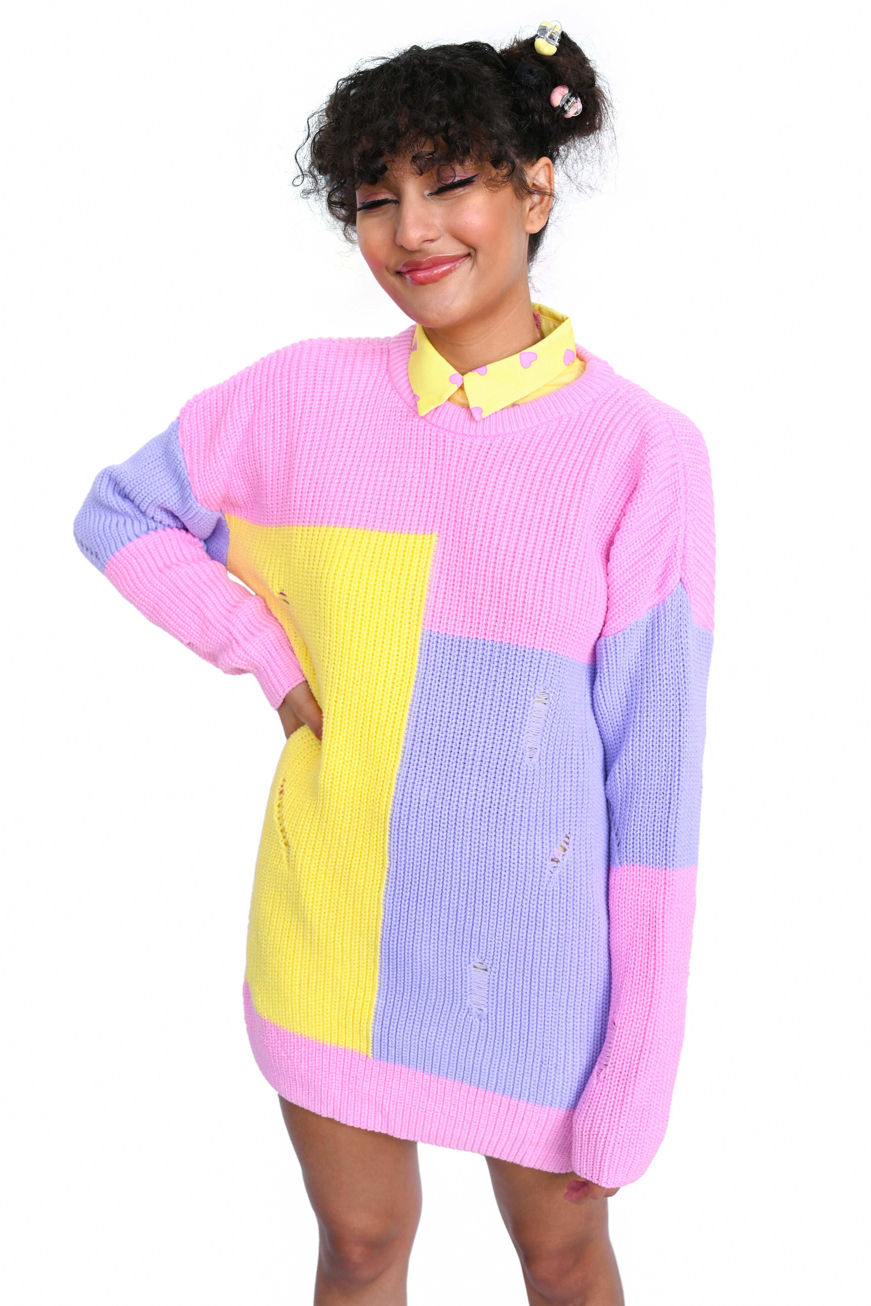 Vibrant candy colored colorblock sweater in lavender, yellow, and pink