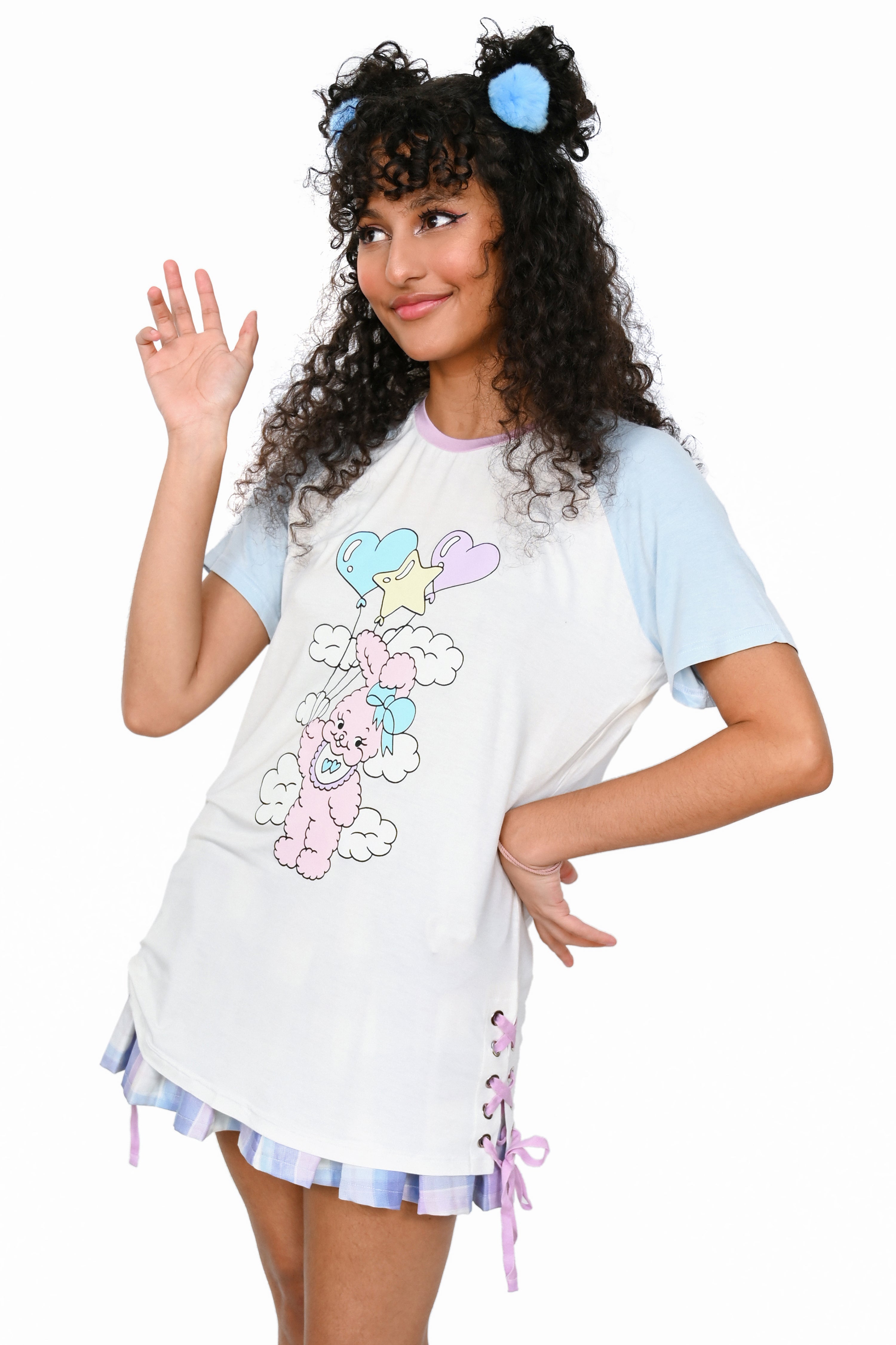 White raglan tee with sky blue sleeves, featuring a graphic with  pink bunny holding balloons