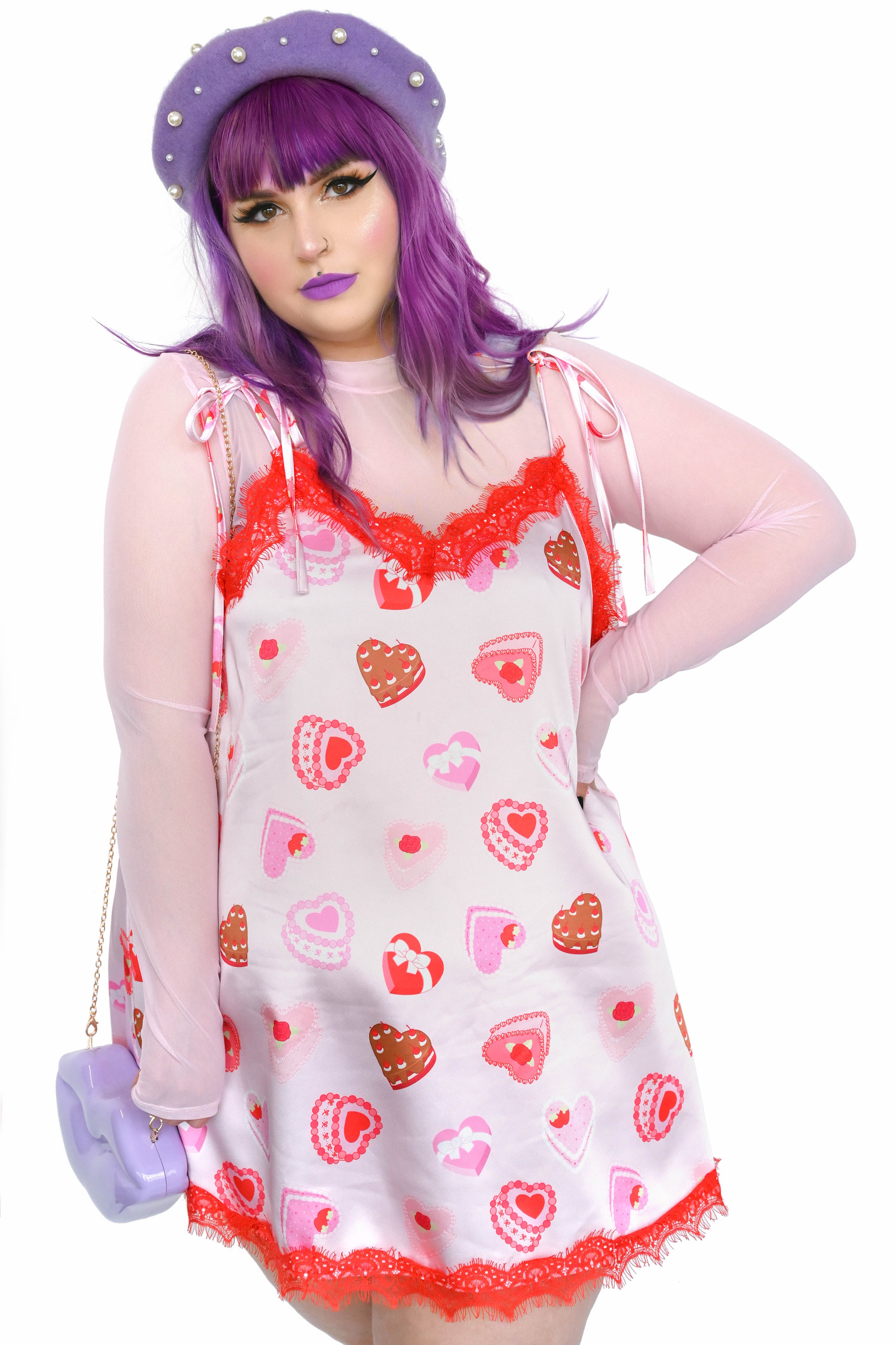 satin slip dress with valentines heart cakes all over print. Red eyelash lace trim. Satin ribbon tie shoulders