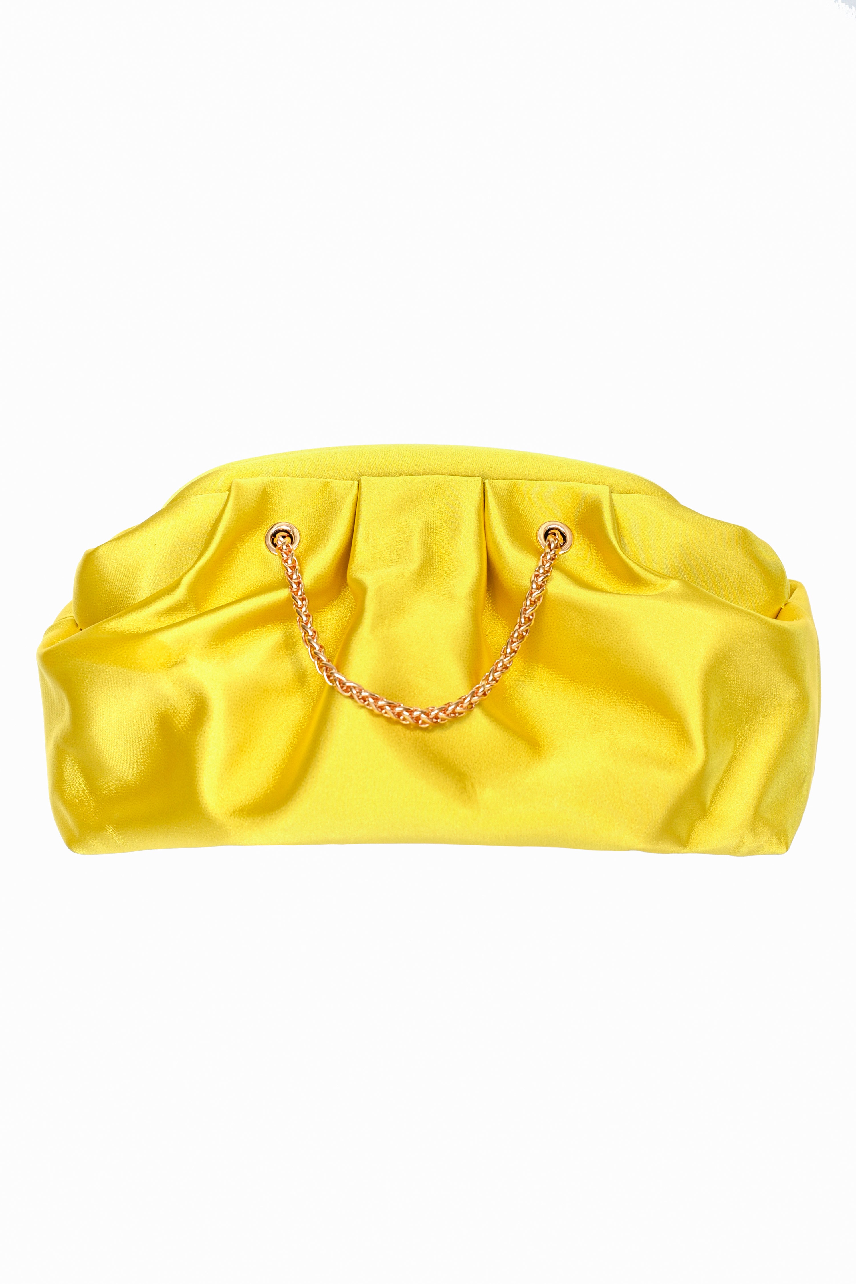 A yellow/gold colored handbag with a gold chain and hinge opening