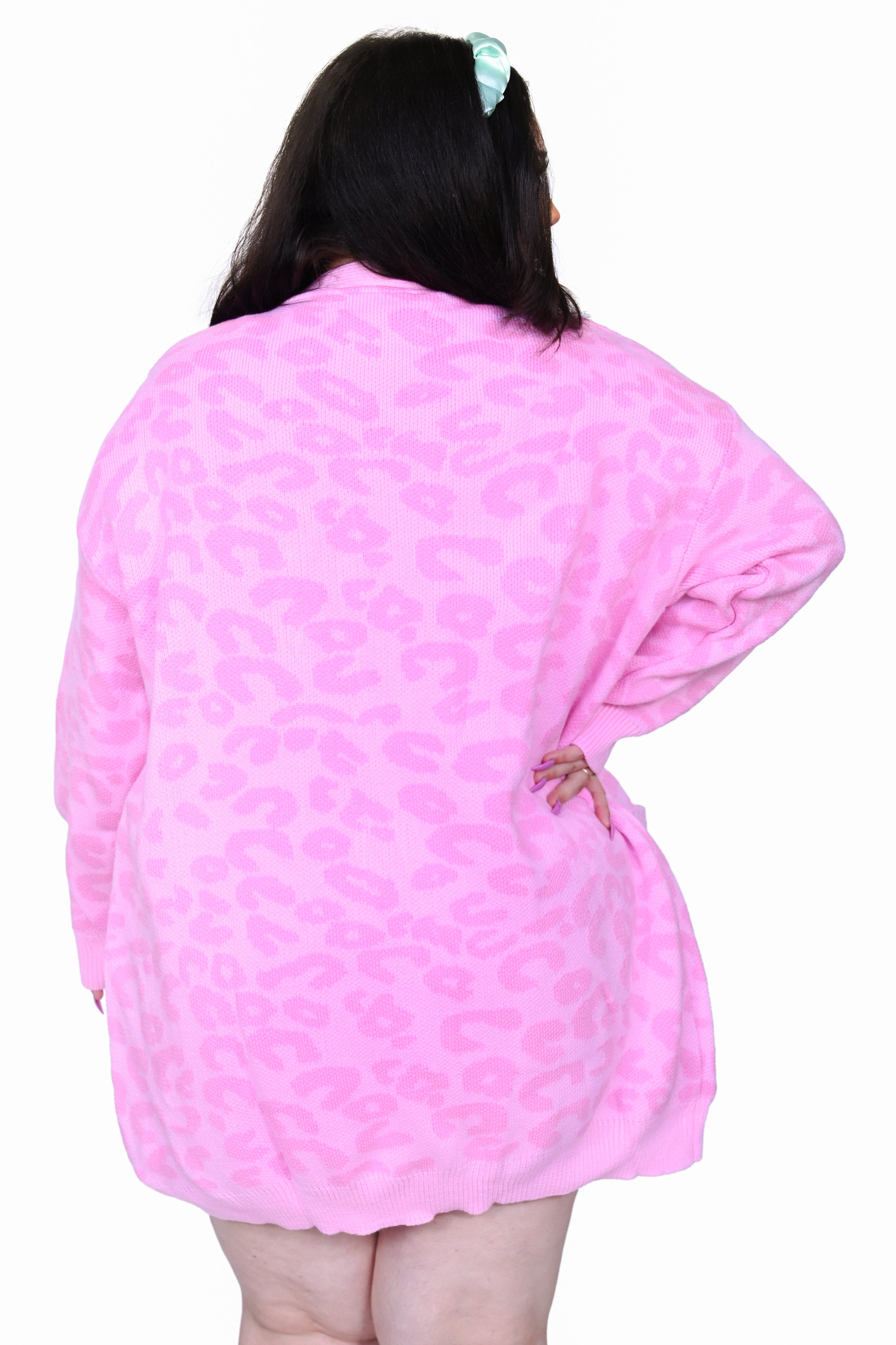All over pink leopard print cardigan in a snuggly oversized fit.