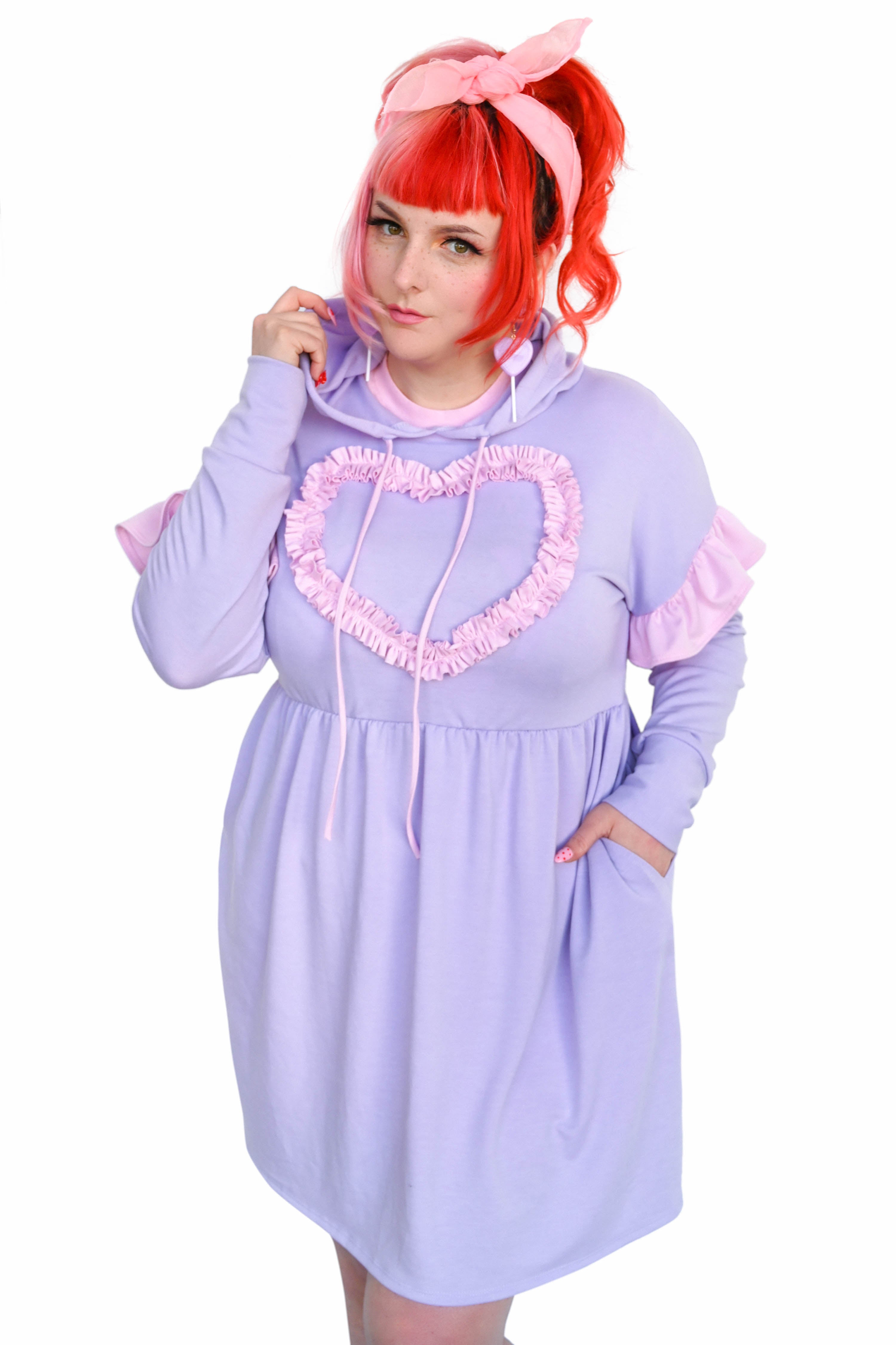 lavender hoodie dress with pink ruffle sleeves and heart chest ruffle "applique". Pink hoodie drawstrings