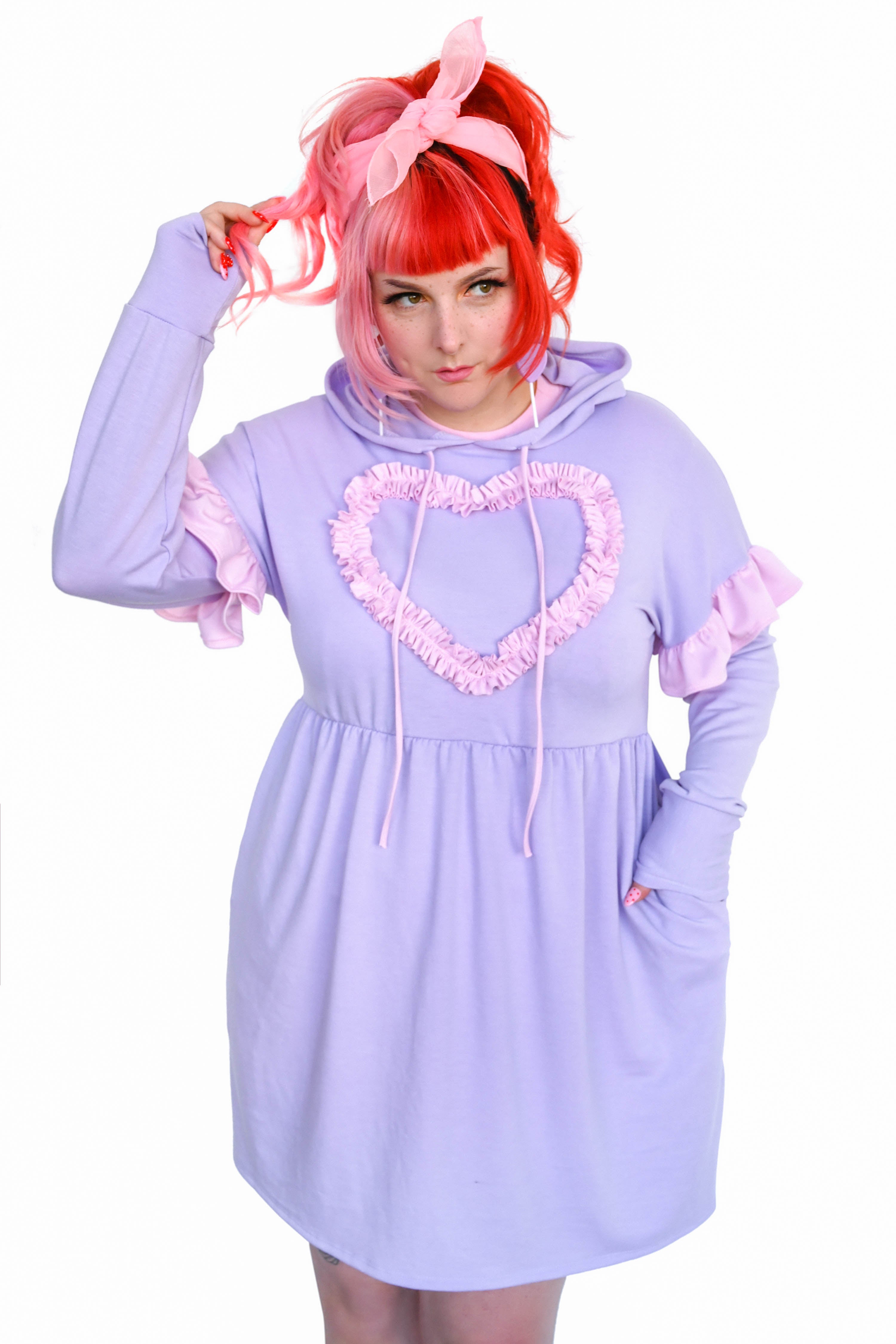 lavender hoodie dress with pink ruffle sleeves and heart chest ruffle "applique". Pink hoodie drawstrings