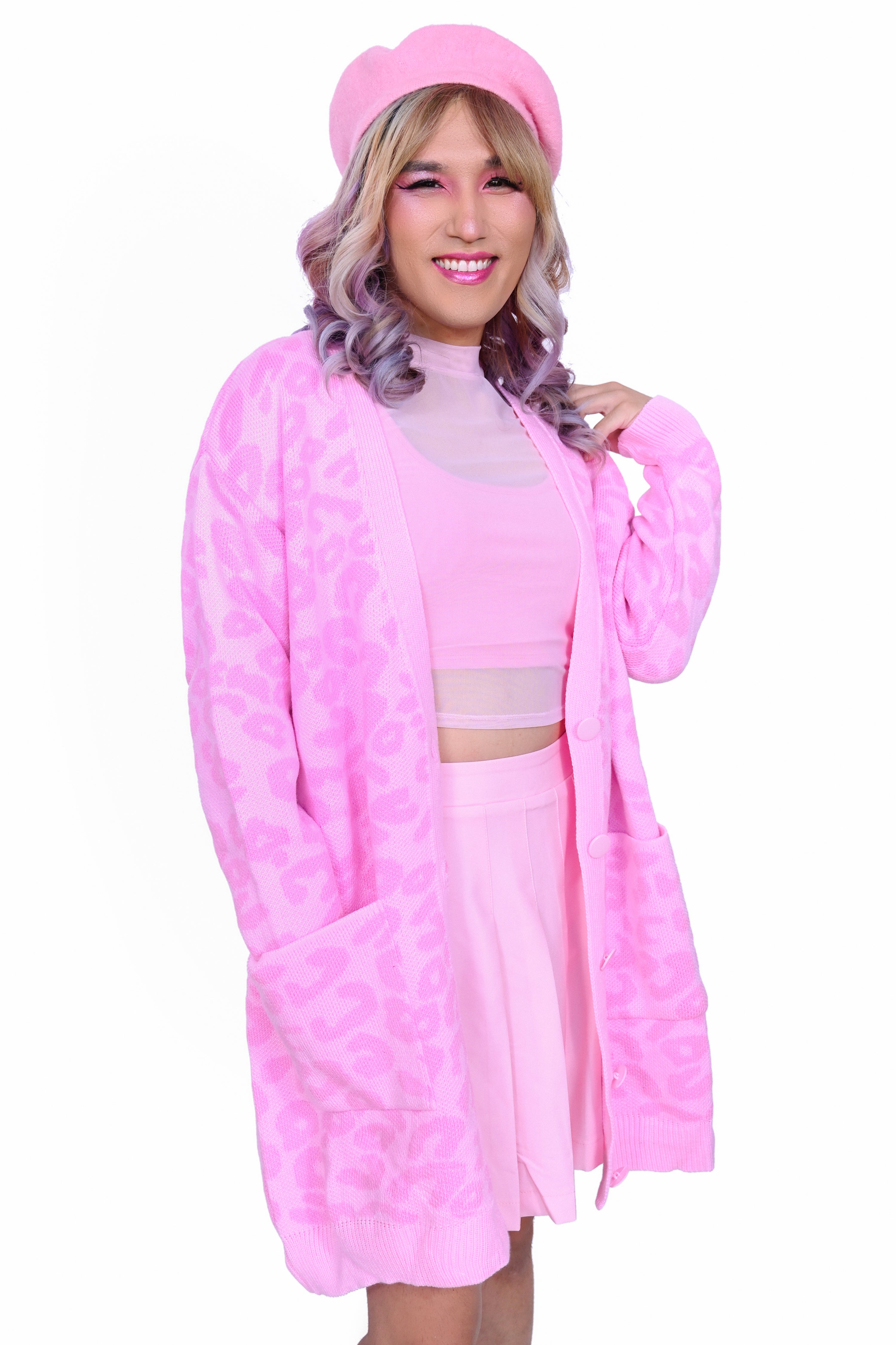 All over pink leopard print cardigan in a snuggly oversized fit.