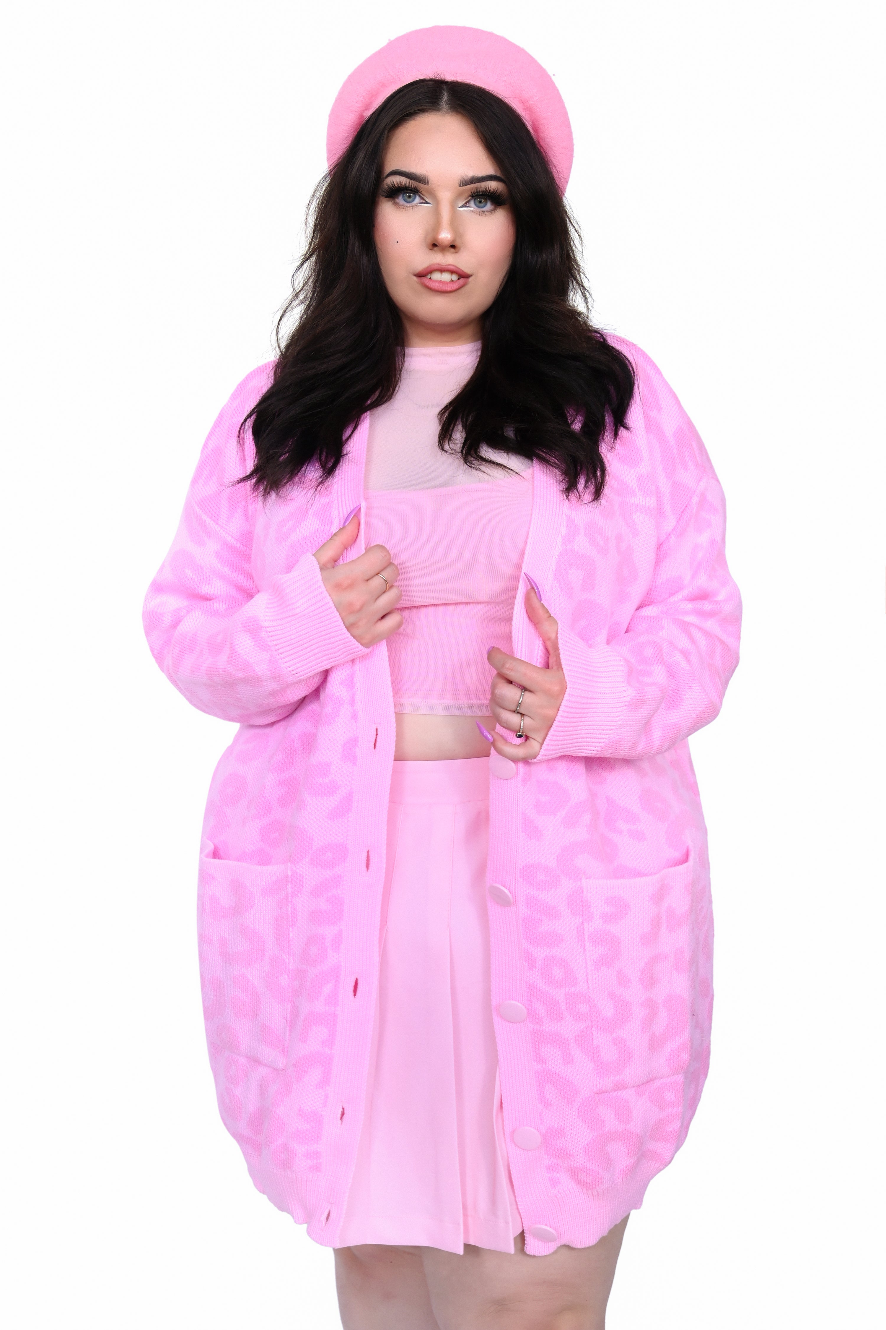 All over pink leopard print cardigan in a snuggly oversized fit.