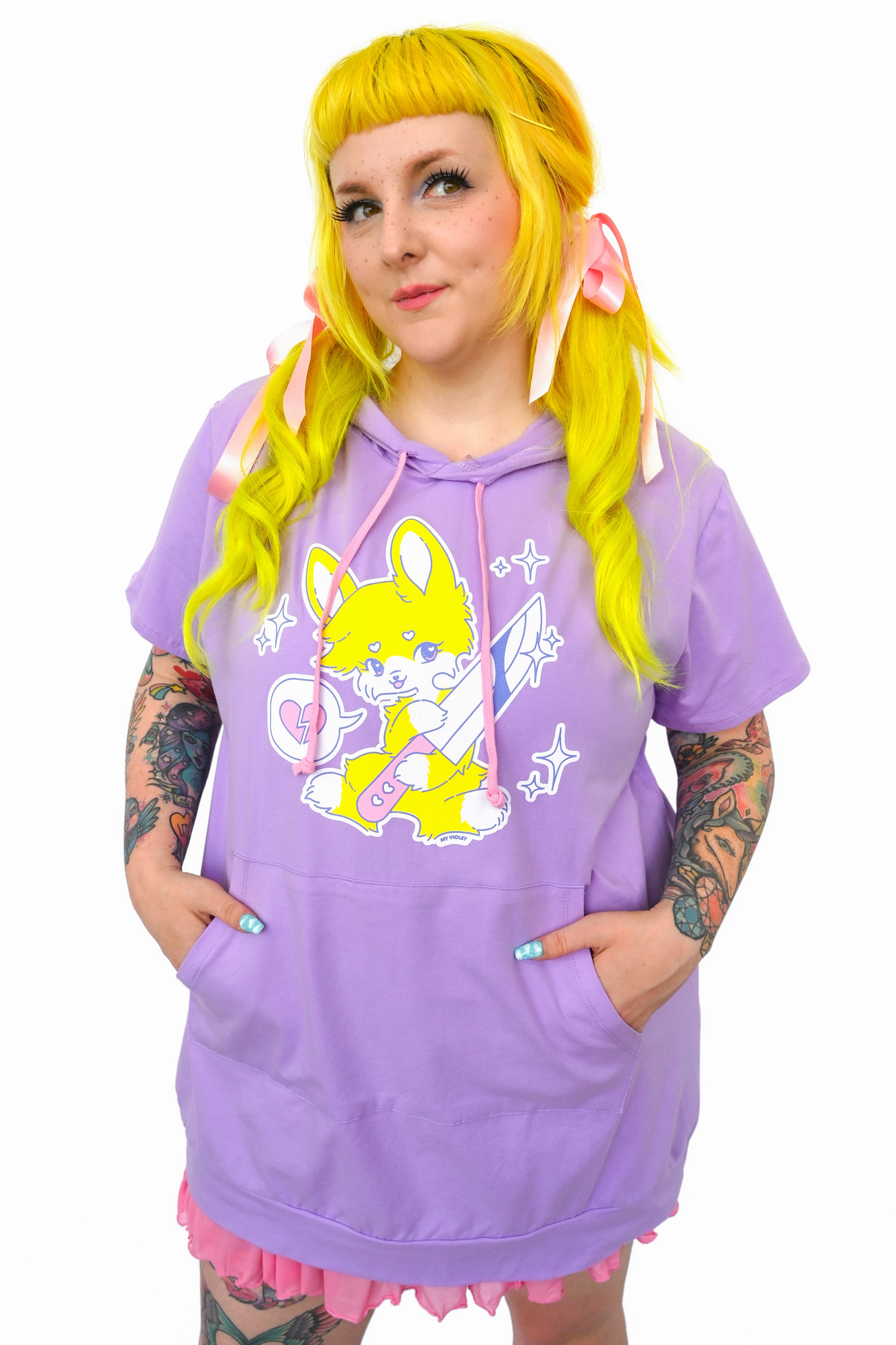 purple hoodie dress with a yellow cartoon bunny holding a sparkly, cute knife