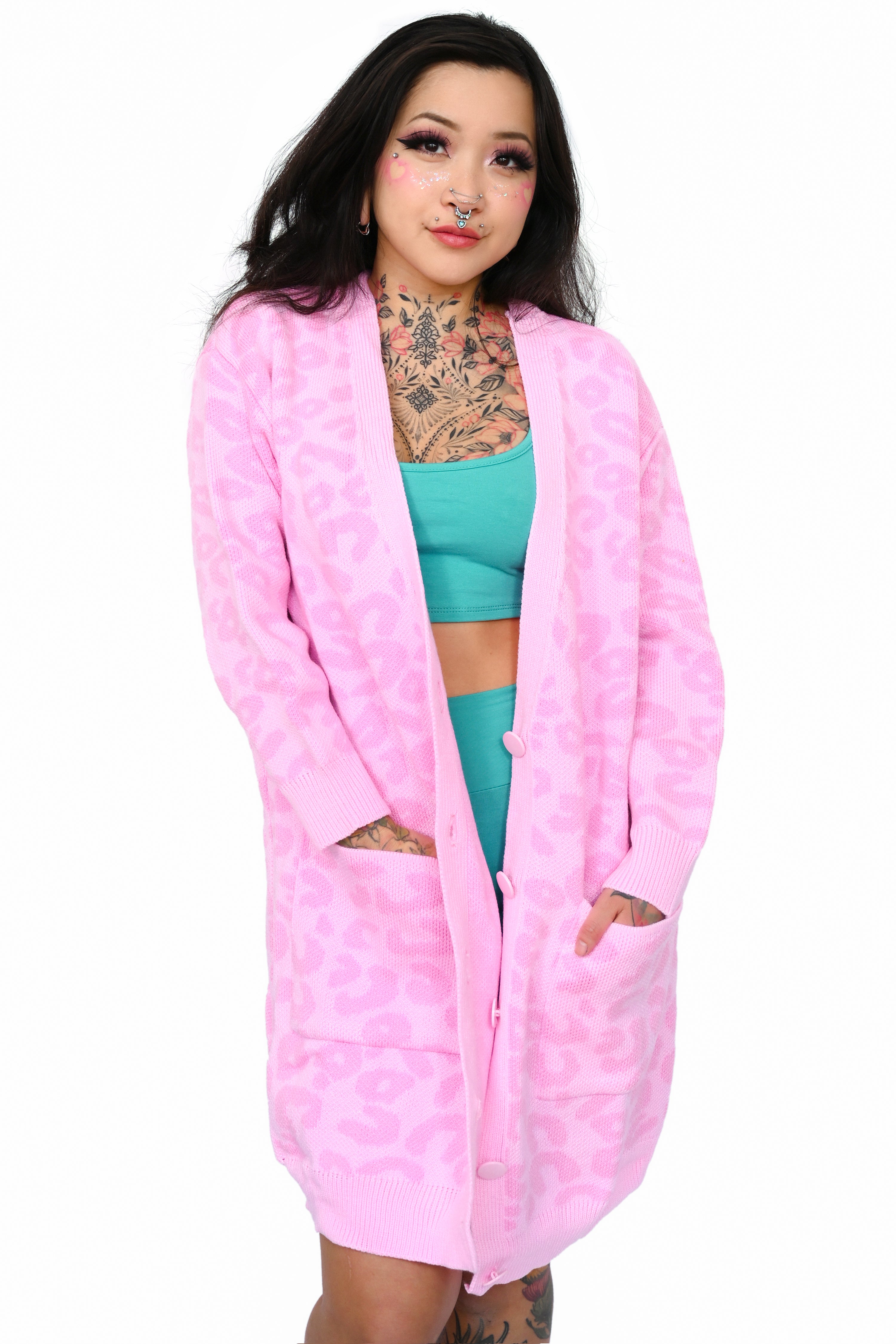 All over pink leopard print cardigan in a snuggly oversized fit.