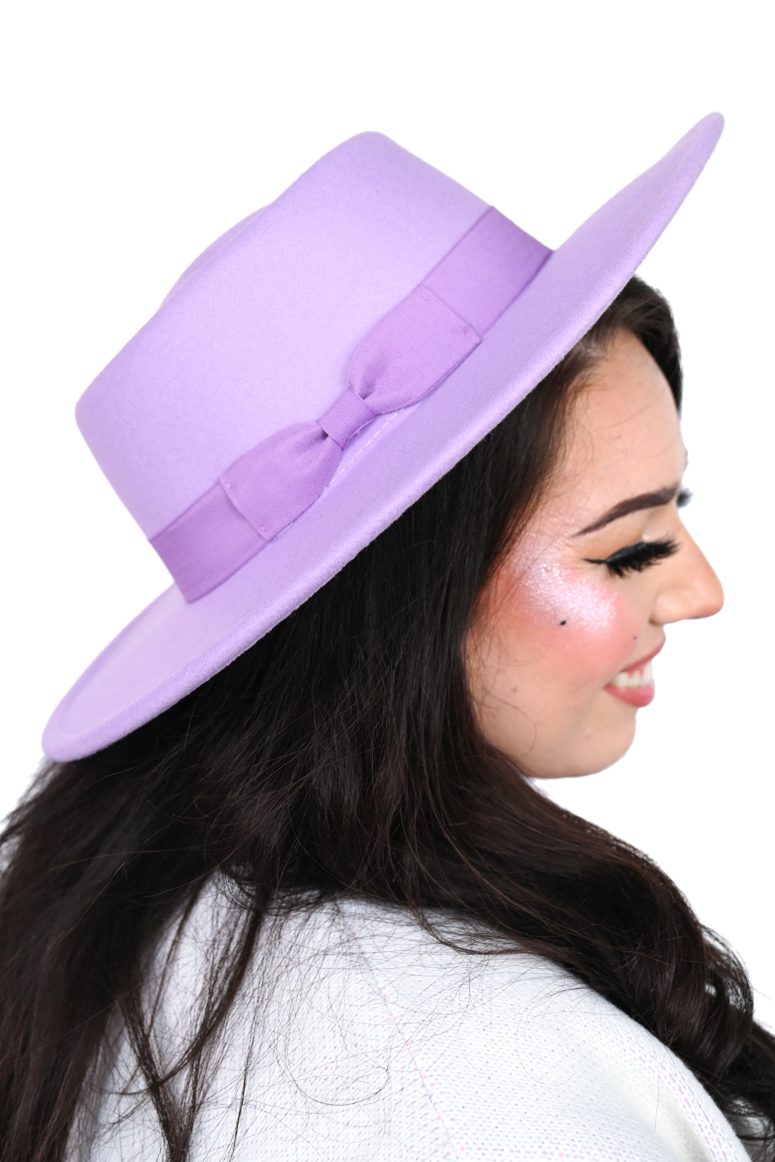 Lavender hard brim hat with bow on hat band