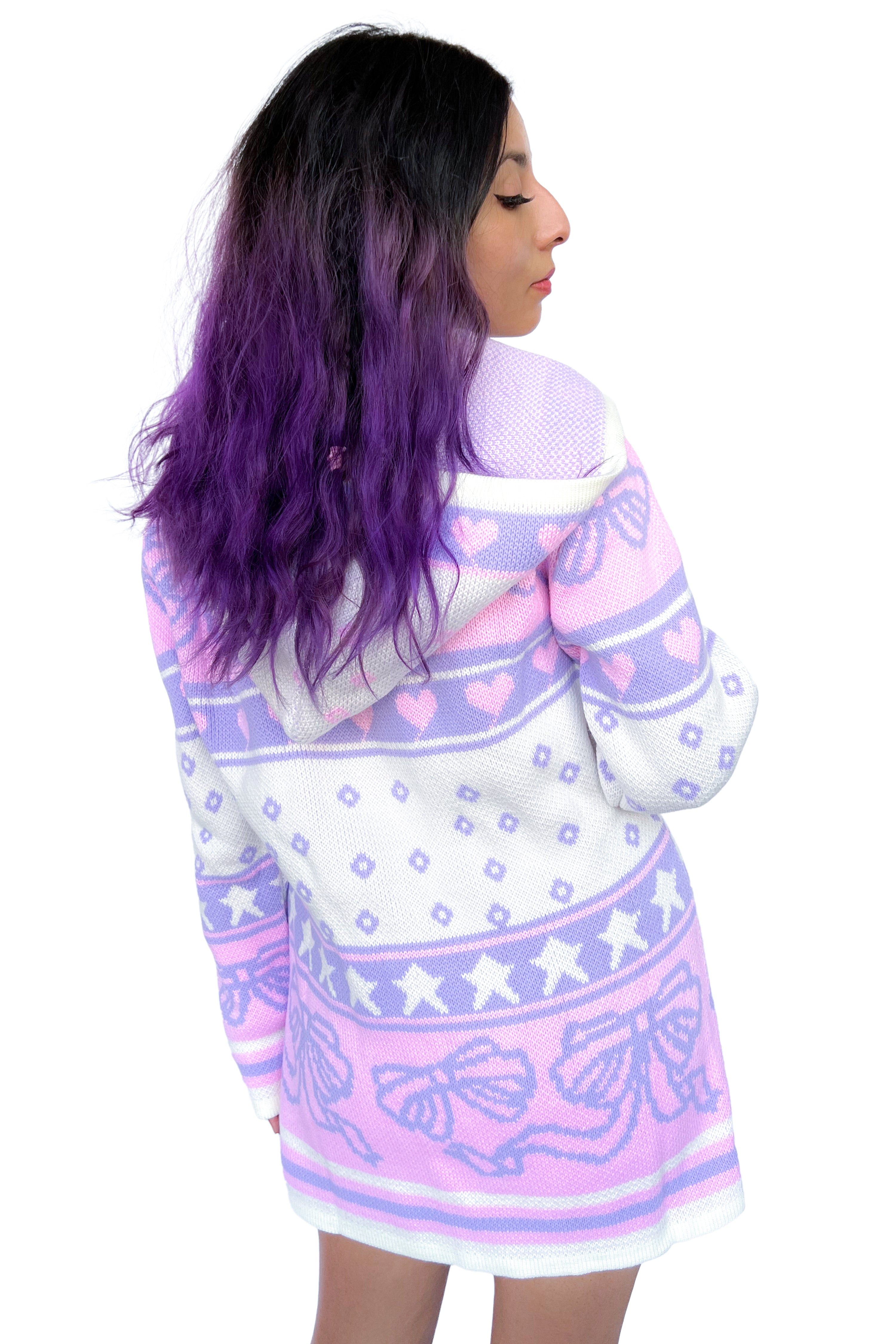 Thick zip up knit sweater with pink, lavender, and white knit, featuring bows, hearts, and stars